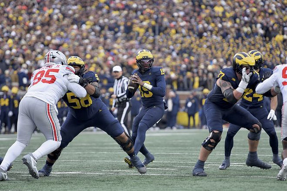 Giovanni El-Hadi (58), Bryce Underwood (19), Blake Frazier (77), and Bryson Kuzdzal (24)