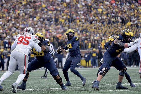 Giovanni El-Hadi (58), Bryce Underwood (19), and Blake Frazier (77)