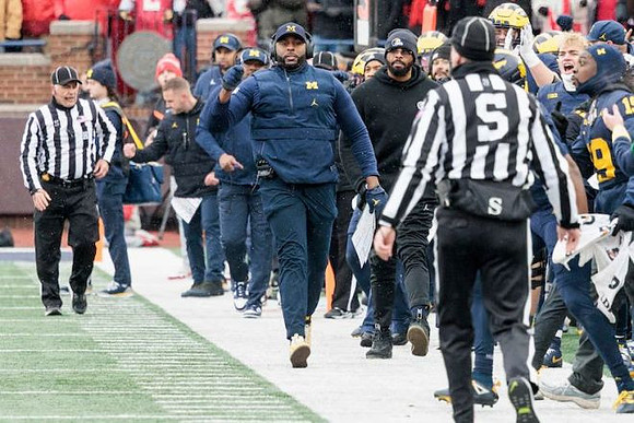 Sherrone Moore and Michigan Team