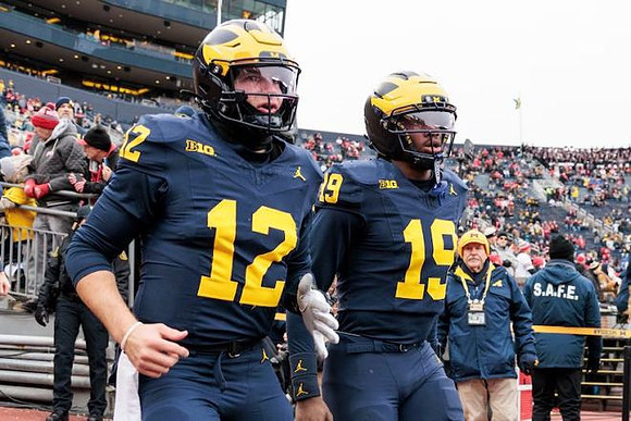 Jake Garcia (12) and Bryce Underwood (19)