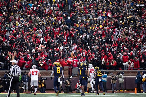 Derrick Moore (8), Jaishawn Barham (1), and Cole Sullivan (23)
