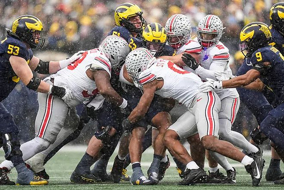 Jake Guarnera (53), Greg Crippen (51), Jordan Marshall (23), and Channing Goodwin (9)