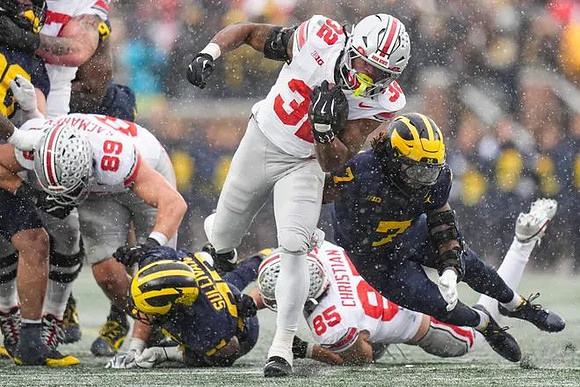 Cole Sullivan (23) and TJ Metcalf (7)