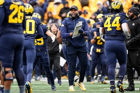 Sherrone Moore and Michigan Team