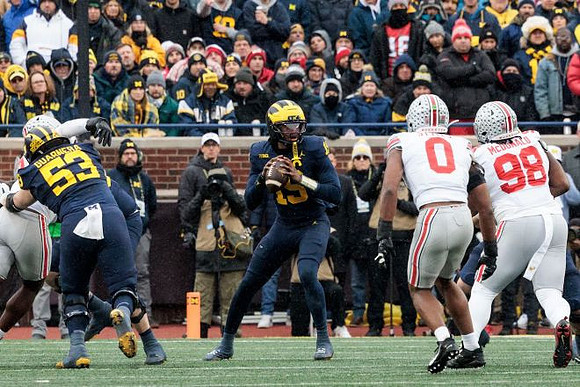 Jake Guarnera (53) and Bryce Underwood (19)