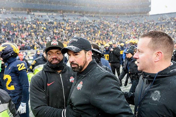 Elijah Dotson (22) and Ohio State Head Coach Ryan Day