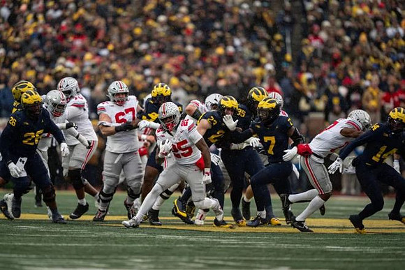 Rayshaun Benny (26), Cole Sullivan (23), Trey Pierce (95), TJ Metcalf (7), and Jordan Young (14)