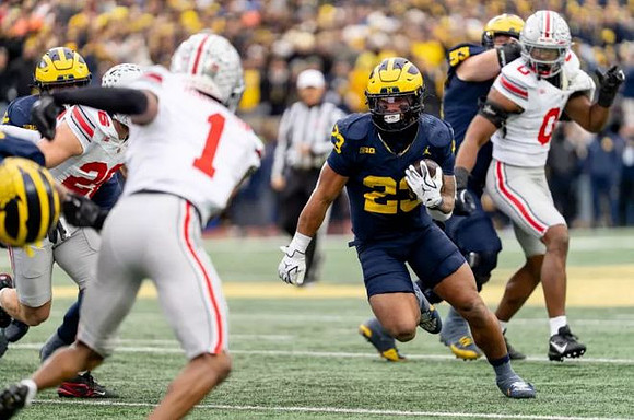 Jordan Marshall (23) and Jake Guarnera (53)