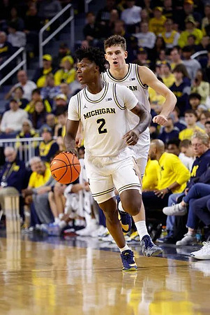 L.J. Cason (2) and Will Tschetter (42)