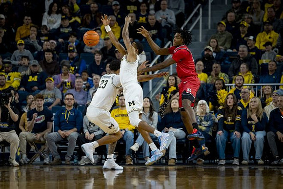 Yaxel Lendeborg (23) and Nimari Burnett (4)