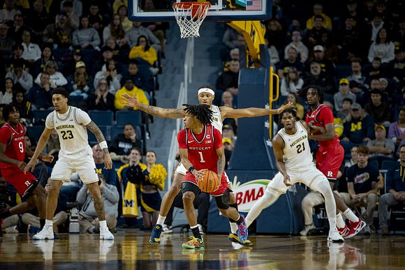 Yaxel Lendeborg (23), Roddy Gayle Jr. (11), and Morez Johnson Jr. (21)