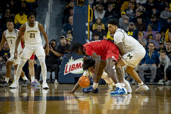 Trey McKenney (1), Morez Johnson Jr. (21), and Yaxel Lendeborg (23)