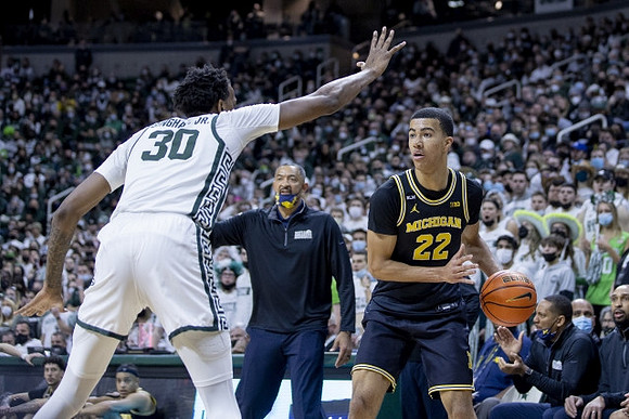 Juwan Howard and Caleb Houstan (22)