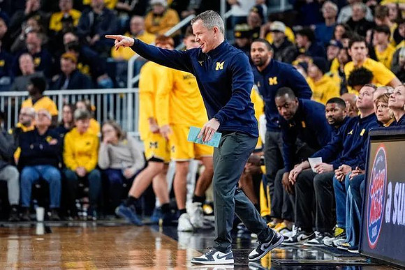 Dusty May and Michigan Team