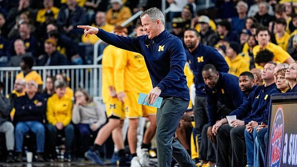 Dusty May and Michigan Team