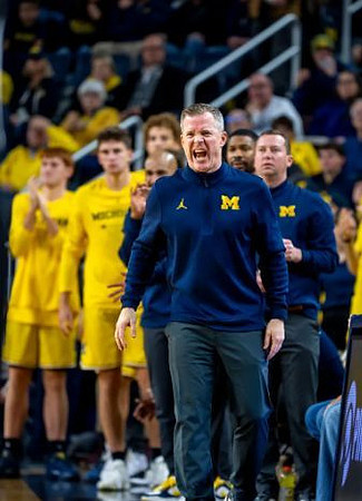 Dusty May and Michigan Team