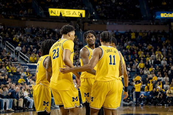 Elliot Cadeau (3), Yaxel Lendeborg (23), Morez Johnson Jr. (21), Roddy Gayle Jr. (11), and Nimari Burnett (4)
