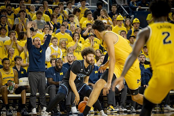 Aday Mara (15) and L.J. Cason (2)