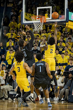 Elliot Cadeau (3) and L.J. Cason (2)