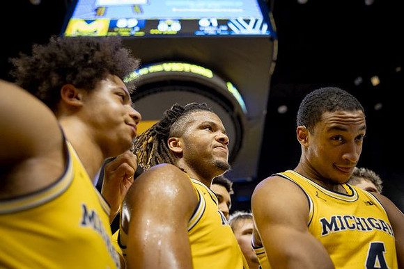 Howard Eisley Jr. (7), Trey McKenney (1), and Nimari Burnett (4)