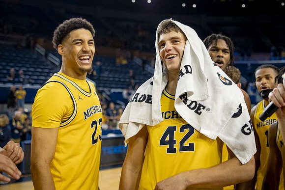 Yaxel Lendeborg (23), Will Tschetter (42), Morez Johnson Jr. (21), and Roddy Gayle Jr. (11)