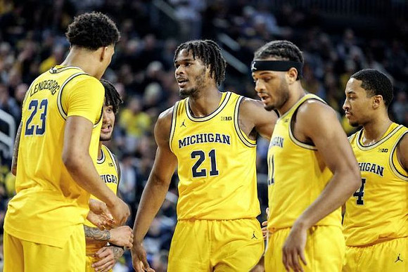 Yaxel Lendeborg (23), Elliot Cadeau (3), Morez Johnson Jr. (21), Roddy Gayle Jr. (11), and Nimari Burnett (4)