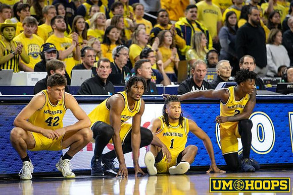 Will Tschetter (42), Morez Johnson Jr. (21), Trey McKenney (1), and L.J. Cason (2)