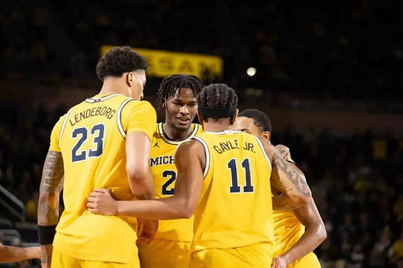Yaxel Lendeborg (23), Morez Johnson Jr. (21), Roddy Gayle Jr. (11), and Nimari Burnett (4)