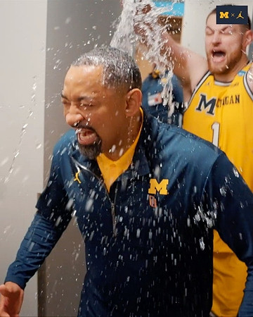 Juwan Howard and Hunter Dickinson (1)