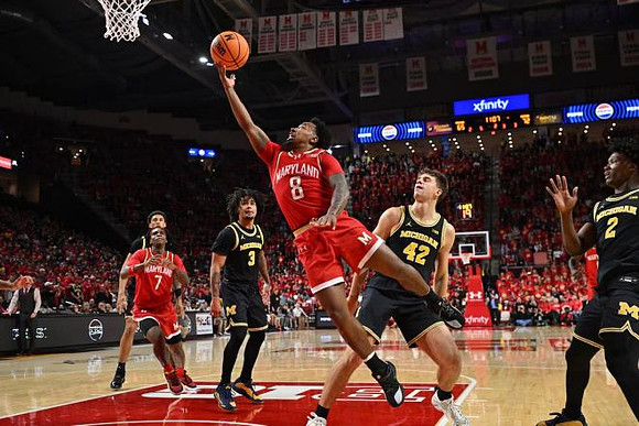 Yaxel Lendeborg (23), Elliot Cadeau (3), Will Tschetter (42), and L.J. Cason (2)