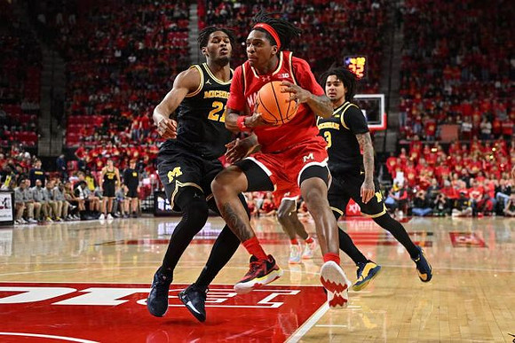 Morez Johnson Jr. (21) and Elliot Cadeau (3)
