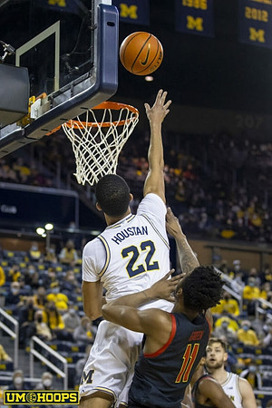 Caleb Houstan (22) and Hunter Dickinson (1)