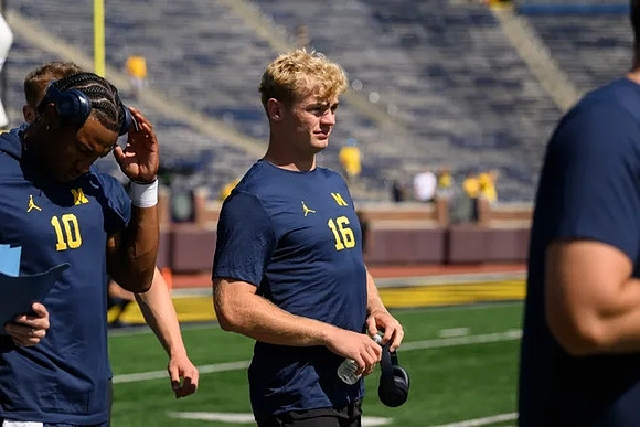 Alex Orji (10) and Davis Warren (16)