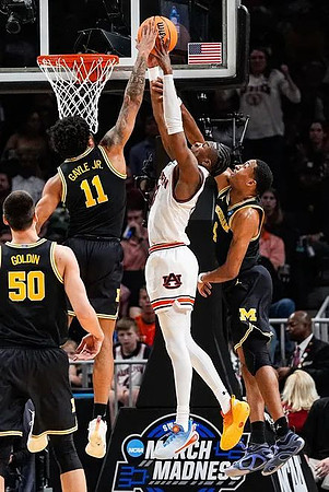 Vladislav Goldin (50), Roddy Gayle Jr. (11), and Nimari Burnett (4)