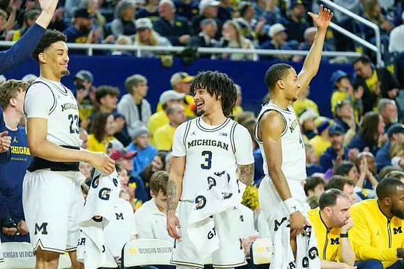 Yaxel Lendeborg (23), Elliot Cadeau (3), and Nimari Burnett (4)