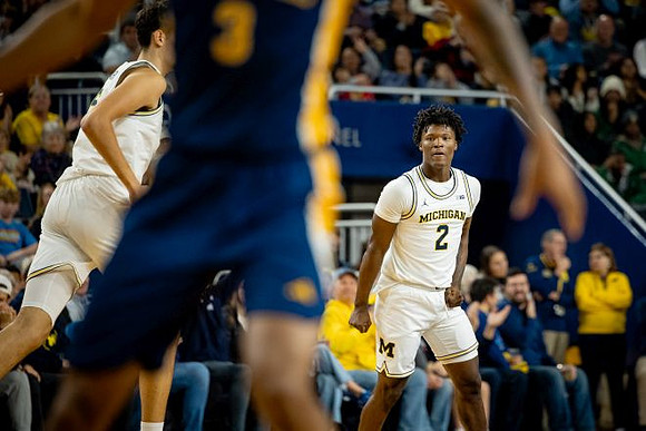 Aday Mara (15) and L.J. Cason (2)