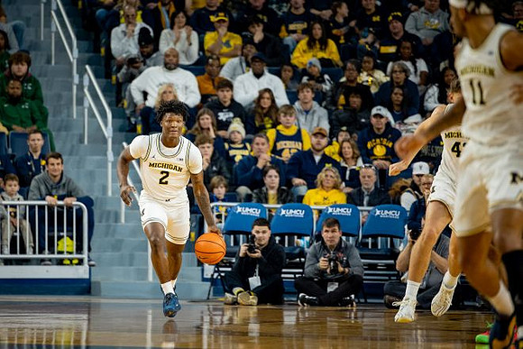 L.J. Cason (2), Will Tschetter (42), and Roddy Gayle Jr. (11)
