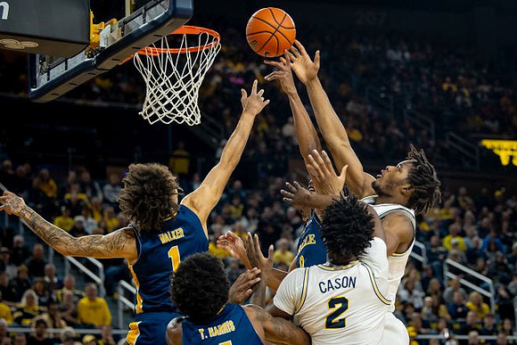 L.J. Cason (2) and Morez Johnson Jr. (21)
