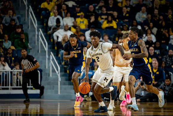 L.J. Cason (2) and Will Tschetter (42)