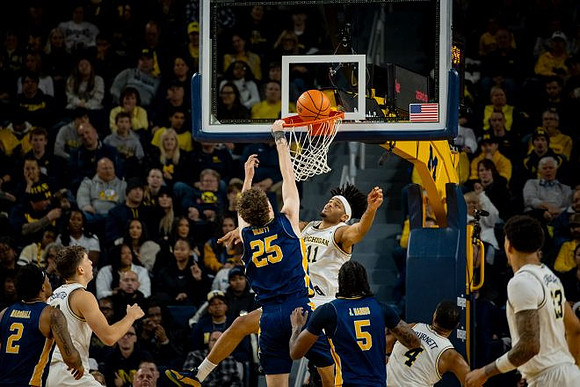 Will Tschetter (42), Roddy Gayle Jr. (11), Nimari Burnett (4), and Yaxel Lendeborg (23)
