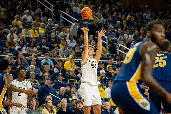 L.J. Cason (2) and Will Tschetter (42)