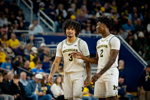 Elliot Cadeau (3) and L.J. Cason (2)