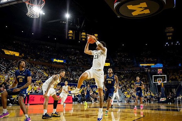 Roddy Gayle Jr. (11), Nimari Burnett (4), and Yaxel Lendeborg (23)