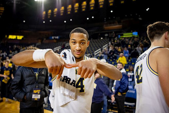 Nimari Burnett (4) and Will Tschetter (42)