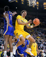Yaxel Lendeborg (23) and Nimari Burnett (4)