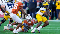 Jake Guarnera (53) and Bryce Underwood (19)