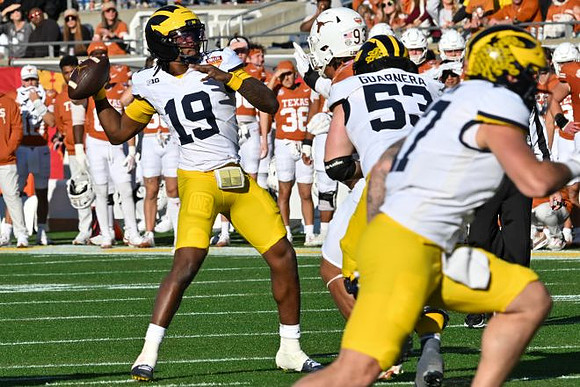 Bryce Underwood (19), Jake Guarnera (53), and Marlin Klein (17)