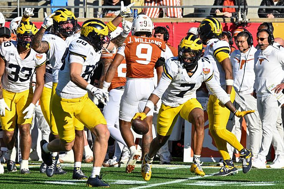 Dominic Nichols (33), Deakon Tonielli (88), and TJ Metcalf (7)