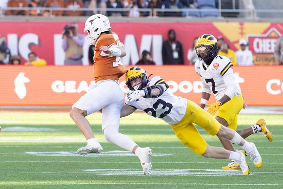 Cole Sullivan (23) and TJ Metcalf (7)