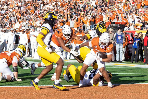 Jordan Young (14), Cameron Brandt (9), and Trey Pierce (95)